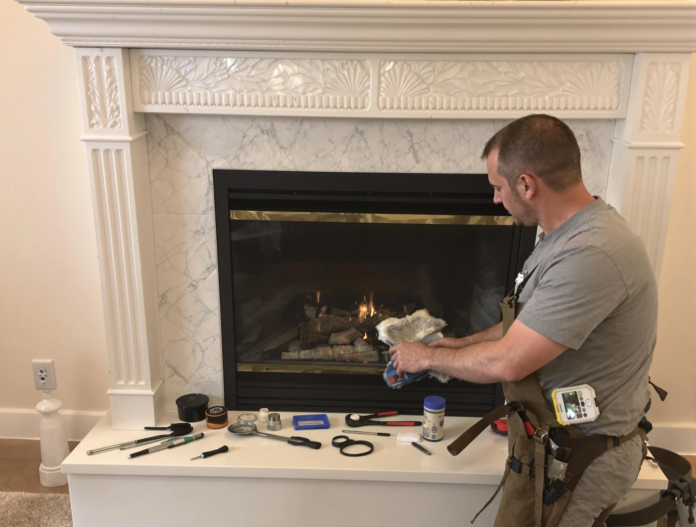 Longmont Chimney Sweep performing fireplace maintenance in Longmont, CO